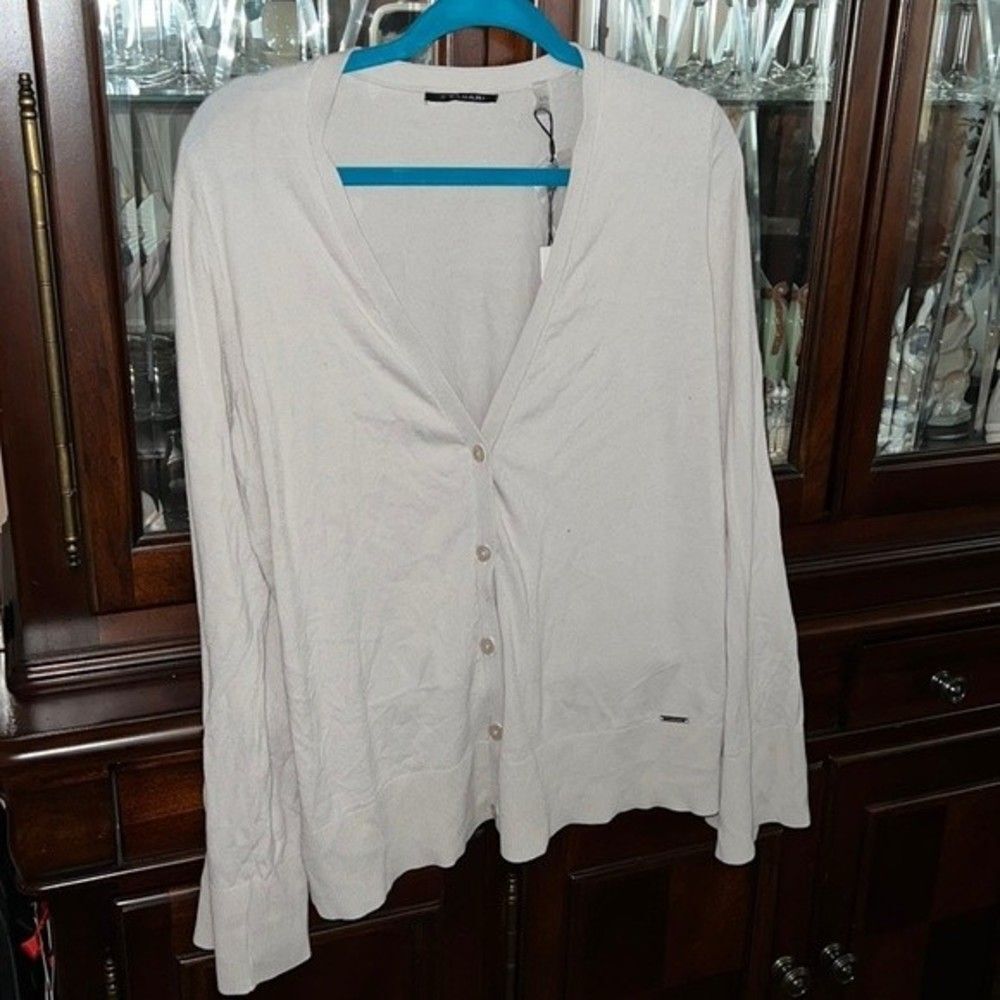 Tahari Cardigan with wide sleeves. Color pale platinum